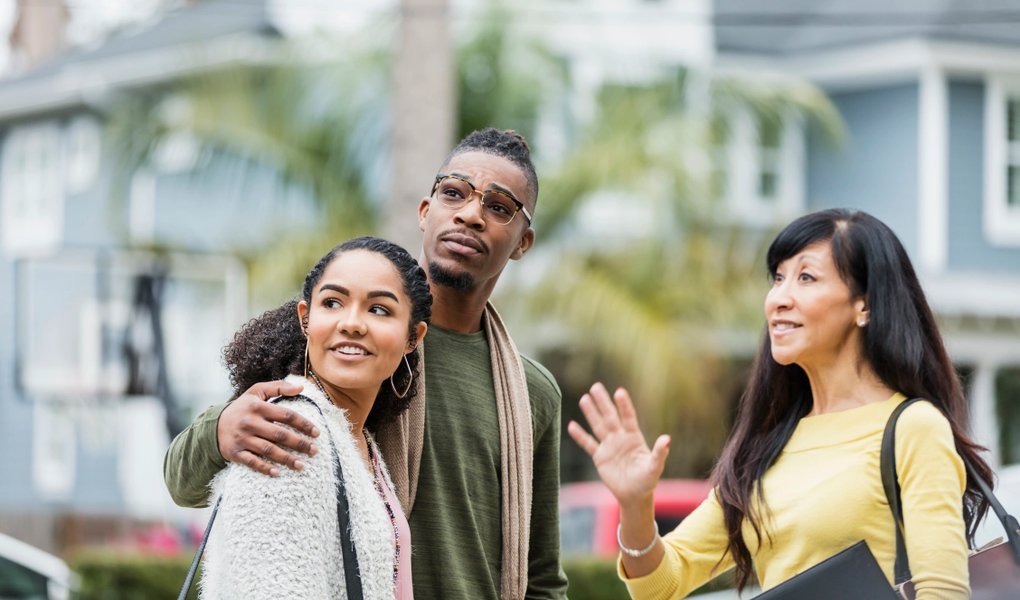 Couple with real estate agent